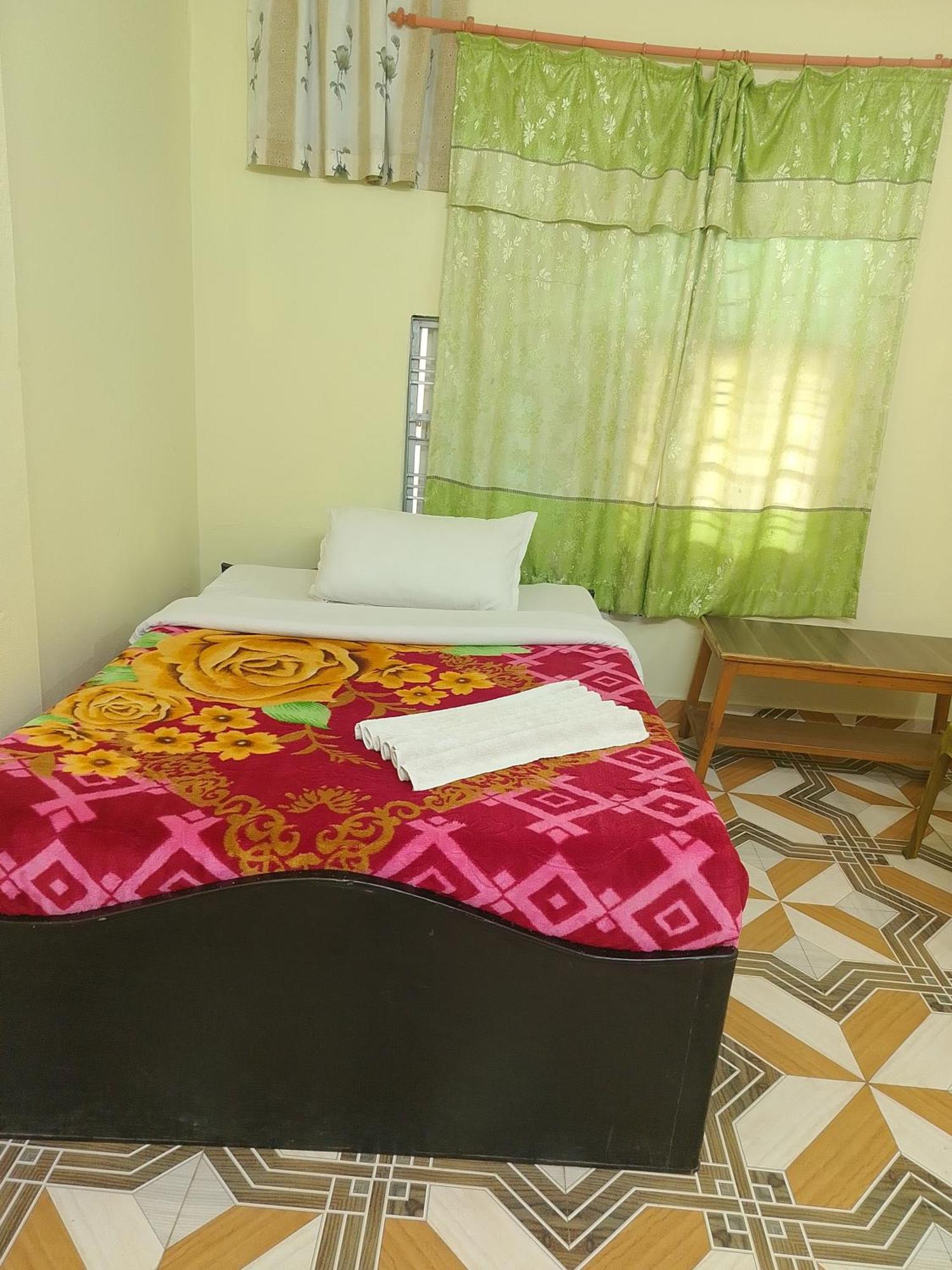 Mangal Homestay Pokhara Værelse billede